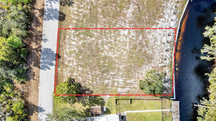 Don't miss out on the opportunity to build on waterfront property that connects to Lake June in the Winter Lake Placid! This lot has recently had a seawall added to the back of the property at the canal and has already been cleared for building. Take your boat to the lake and enjoy the views of this wonderful waterfront lot.