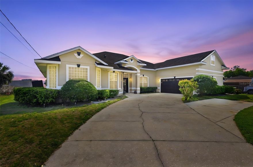 Spacious custom designed home offering 5 bedrooms, 3.5 bathrooms, and 3,348 square feet of thoughtfully designed living space. From the moment you enter, you are welcomed by beautiful mosaic flooring in the foyer and soaring ceilings that create an open and airy feel throughout the home.  Designed for both comfort and entertaining, the home features two separate living areas, including a main living room with a cozy fireplace and built in surround sound speaker system. The kitchen offers abundant cabinet and counter space, along with an eat in kitchen area and a separate formal dining room showcasing elegant architectural columns.  Upstairs you will find a versatile bonus space perfect for a media room, game room, office, or additional living area. The spacious primary suite features multiple closets for ample storage and a built in vanity area located in the hallway leading to the primary bathroom.  Step outside to enjoy the screened in back patio, offering a comfortable space to relax or entertain.  Additional updates include a 5-ton A/C unit replaced just 2 months ago and a roof only 5 years old, giving peace of mind for years to come. The home also features a spacious driveway and unique custom details throughout, as it was originally designed by the owner.  Conveniently located near historic downtown Sanford, Lake Monroe, the Central Florida Zoo, and just minutes from I 4, shopping, dining, and entertainment.