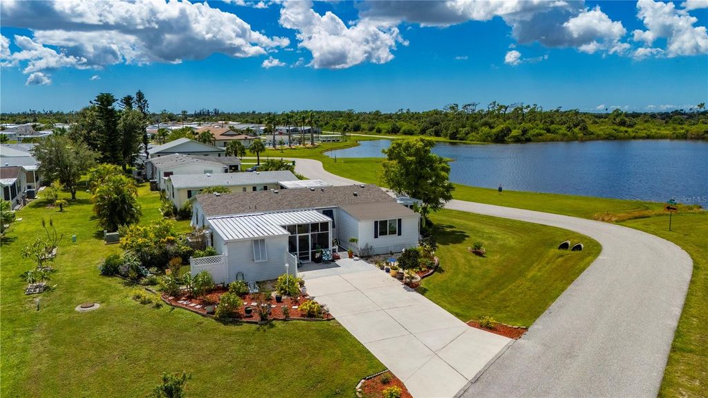 Photo of 3949 Russell Avenue, Port Charlotte, FL 33953 (MLS # C7515562)