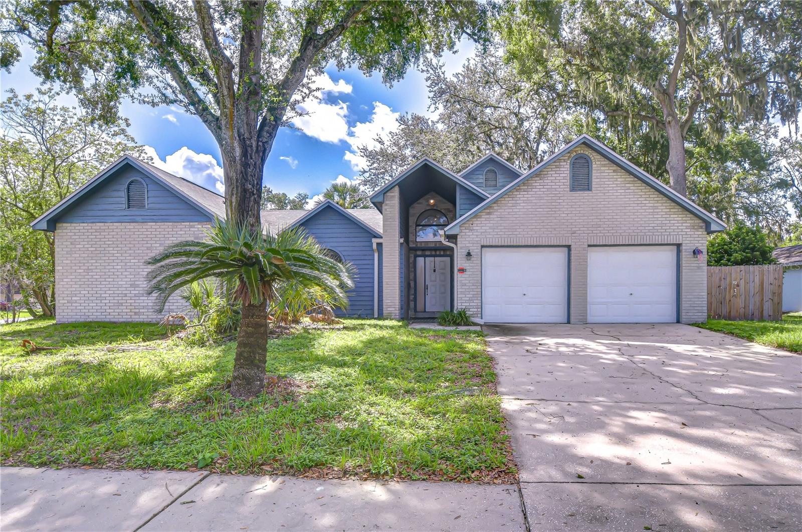 3/2 pool home on corner lot in picturesque Turtle Lakes . This home is nestled amongst mature trees that exude a sense of community. An open floor plan features a foyer that leads to the Living Room & Primary Bedroom Suite on the left or thru the Dining Room into the generous sized Family Room with fireplace on the right. The primary bedroom, dining room and family room all have sliders to the spa/pool/ patio area. The Kitchen has a charming Breakfast Nook overlooking the backyard. The remaining 2 bedrooms and bath form their own wing of the home. Completing the layout is an inside Utility Room leading to a large 2 car garage. This home needs a total makeover and is your chance to decorate to your taste. Turtle Lakes has NO HOA or CDD fees and is conveniently located off County Line Rd and SR 54. Close to shopping, restaurants & health care. Come see this opportunity in work clothes today!!