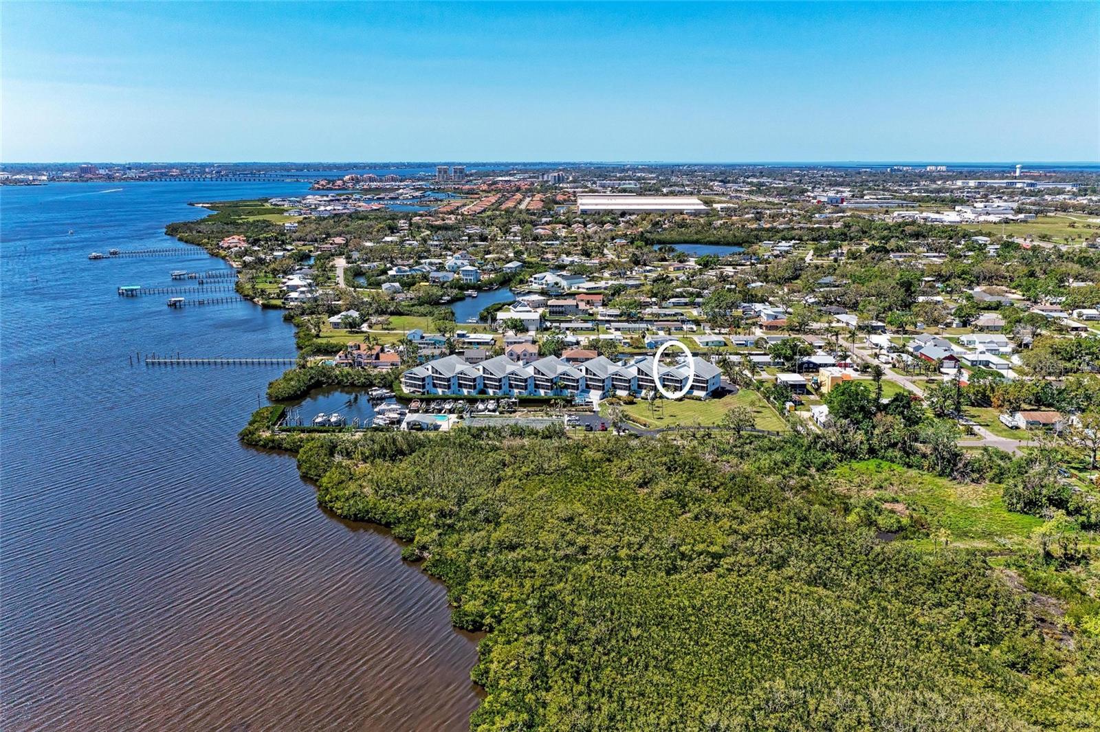 Available September 16th--River Place gated community condos on the Manatee River! This 2 bedroom, 2 bath, top floor unit is available Partially Furnished (additional fee) or Unfurnished with all appliances including washer and dryer. Rent while your home is being built or relocating to the area to get acquainted with all that Manatee County has to offer. This condo has the perfect open floor plan. Interior features include a dine-in kitchen breakfast bar, wood cabinets with granite surfaces, and neutral colors on walls and flooring. Upgraded luxury vinyl plank flooring is extended throughout the family/dining area, kitchen, bedrooms, and foyer as well as the utility room. The spacious master bedroom is tucked away from the second bedroom. This unit includes 2 covered parking spaces, a storage closet at ground level and another storage closet on the balcony for any seasonal extras. River Place community offers a waterfront pool, screened pool house with bathrooms and community grill station, transient day-dock, and water access for kayaks. Owner pays monthly association fee. Water and basic cable included with monthly rent. Tenant pays for upgraded cable tv, electric, internet, credit/background fee, and association application fee. First, last and one month security due at lease signing. This is a PET FRIENDLY rental. Convenient access to I75 to head north or south. Come take a peek at this unique community to call home. Schedule your showing today!