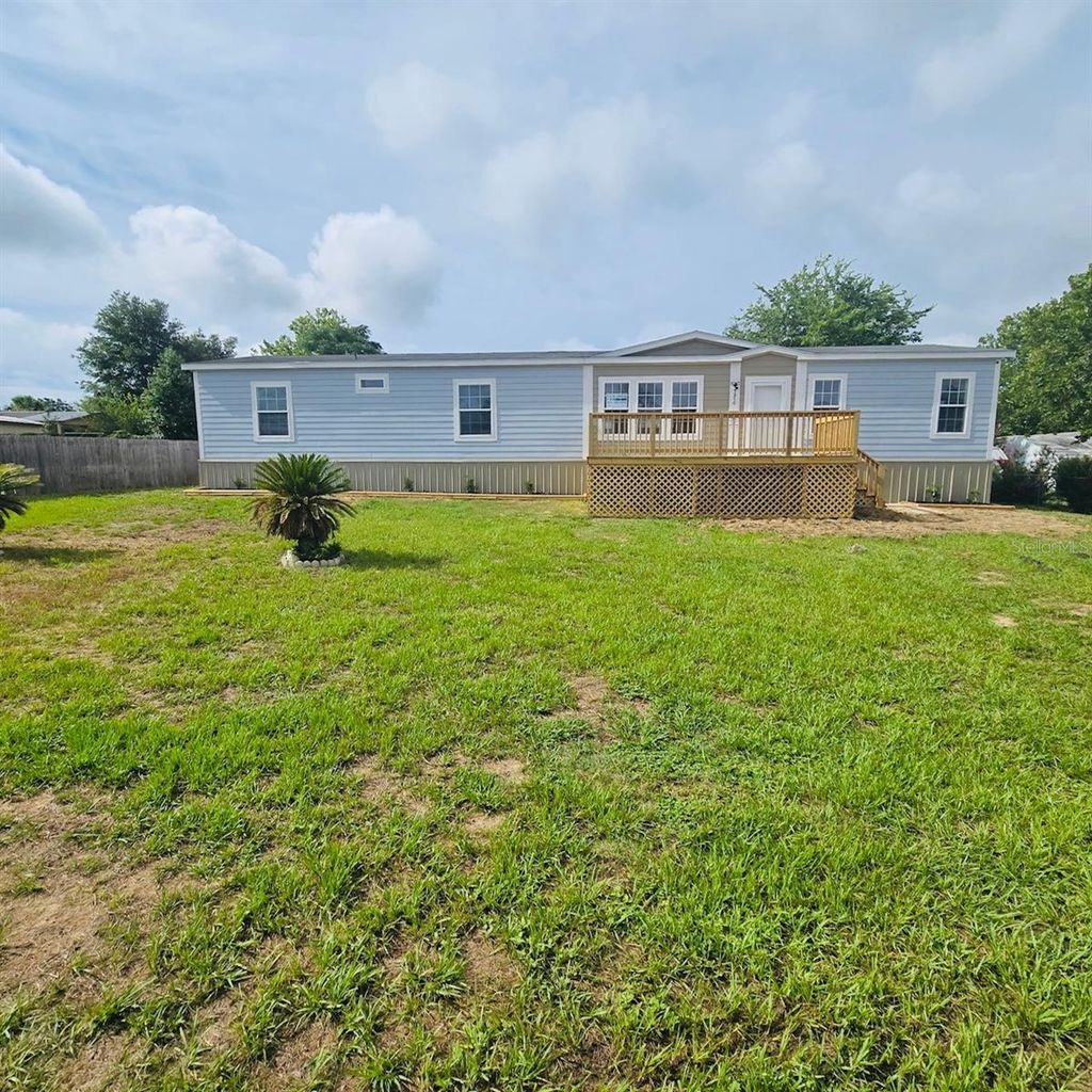 Photo of 5870 SE 140th Street, Summerfield, FL 34491 (MLS # W7877036)