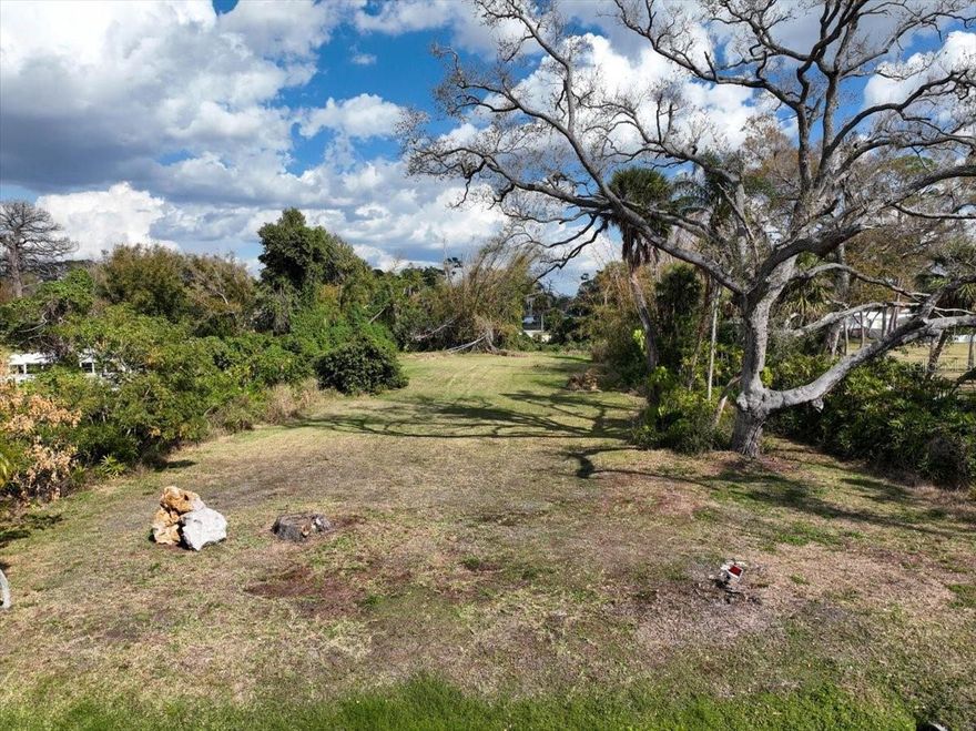 WHAT A GREAT LOCATION! Oversize Lot in the Downtown area of Old Englewood-Just blocks from Historic Dearborn Street with Many Restaurants and Shopping, freedom Boat club, Royal palm Marina, Indian Mound Park and boat ramps. Just under 1 acre-measuring 139x280 has plenty of room for your new Home with space for a Detached Garage/Workshop or with the RSF3 Zoning per county records you can possibly subdivide and build up to 4 homes. This Location is also close to Englewood Beach, Hospital, Medical/Professional facilities, and many Golf courses. A home was previously on the property so public water, sewer and electric are available, also 3 culvert driveways are in place.