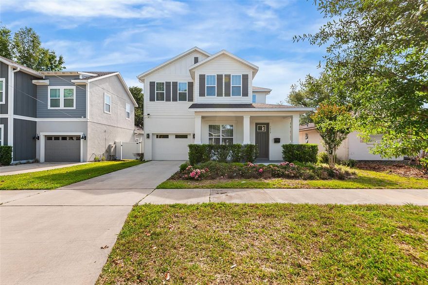 One or more photo(s) has been virtually staged. Welcome Home! This masterfully designed home is in the heart of Orlando's coveted SODO neighborhood, where designer finishes, thoughtful layouts, and resort-caliber outdoor living come together under one roof. Step inside into a generous foyer that immediately sets the tone — luxury Mohawk laminate flooring throughout, soaring ceilings, and curated designer lighting flow throughout the entire first floor. Off the foyer, a glass-door flex room wrapped in dramatic dark hexagonal wallpaper is ideal as a private home office, study, or creative space. A stunning botanical-wallpapered powder room just off the entry adds an unexpected moment of personality that guests will not forget. The heart of the home is the open-concept kitchen, dining, and living area — a space that is nothing short of extraordinary. The chef's kitchen features floor-to-ceiling gray shaker cabinetry with matte black hardware, an oversized black center island with quartz countertops and farmhouse sink, a gas cooktop beneath a commanding black statement range hood, a full suite of Café appliances with brushed bronze accents including a French door refrigerator and built-in double wall oven, under-cabinet lighting, and artisan pendant lighting in gold and glass. The adjacent dining area seats a crowd with ease, and the expansive living room anchors the space with a striking textured gray stone accent wall, designer branch chandelier, and full-view sliding glass doors that blur the line between indoors and out. The first-floor primary suite is a true sanctuary. Tucked privately off the living area, the primary bedroom features a tray ceiling with sleek black ceiling fan, and opens directly into a spa-caliber en-suite bath complete with a dual-sink gray shaker vanity, quartz countertops, an oversized frameless walk-in shower with full subway tile surround, dual rain and handheld shower heads. A custom built-out walk-in closet completes the suite. A dedicated laundry room with Samsung front-load washer and dryer and patterned encaustic tile floor, plus a mudroom bench with hooks and shelving off the garage entry, round out the highly functional first floor. Upstairs, four generously sized bedrooms each feature wide-plank LVP, designer lighting, and ample natural light. Two full bathrooms serve the upper level — one with a dual vanity, subway tile walk-in shower, and glass surround; another with a tub/shower combo — both outfitted with gray shaker cabinetry, quartz countertops, and matte black fixtures throughout. Step outside through the living room sliders to a fully screened outdoor kitchen and lounge with a stainless gas grill, dedicated range hood, mini fridge, dark tile backsplash, ceiling fan, and a sectional seating area — all opening to a fully fenced, private backyard with room to add a pool. Whether you're entertaining a crowd or unwinding after a long day, this outdoor space delivers year-round Florida living at its finest. All of this just minutes from Downtown Orlando, the Hourglass District, the Milk District, SODO's vibrant dining and retail scene, Dr. Phillips Performing Arts Center, and easy access to I-4 — one of the most walkable and lifestyle-rich corridors in all of Central Florida.
Homes like this don't come along often. Schedule your private showing today.