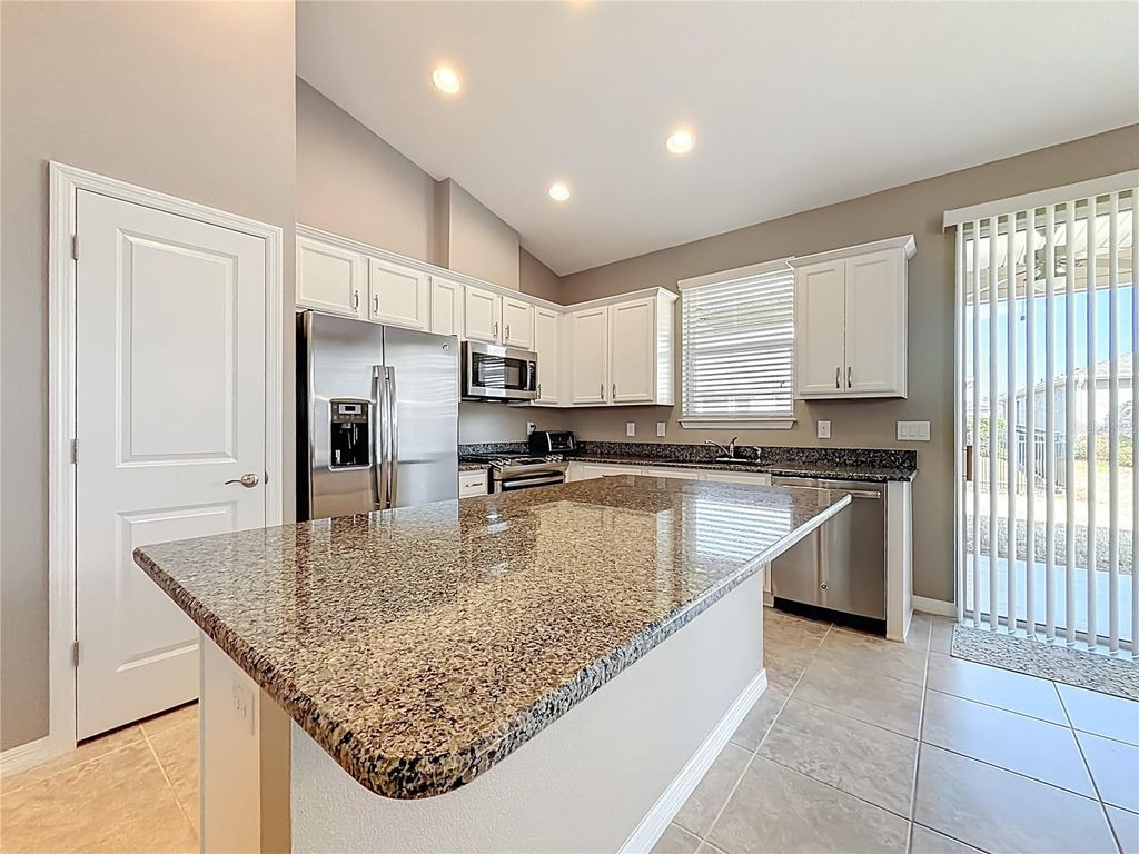 Photo of 5647 NW 37th Lane Road, Ocala, FL 34482 (MLS # OM717334)