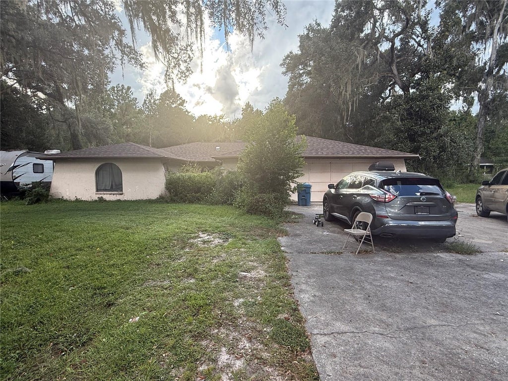 Photo of 9405 Wallien Drive, Brooksville, FL 34601 (MLS # W7890060)