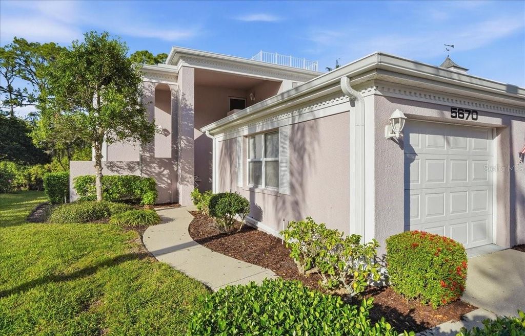 Photo of 5670 Sheffield Greene Circle #72, Sarasota, FL 34235 (MLS # A4682991)