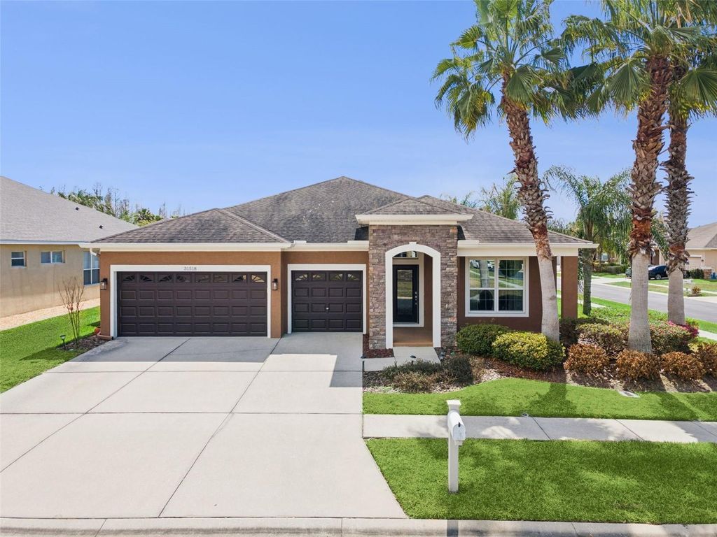 Photo of 31518 Bearded Oak Drive, Wesley Chapel, FL 33543 (MLS # L4959882)