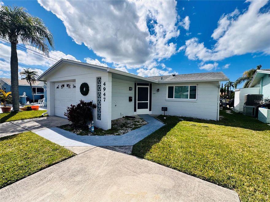 Welcome to your beautifully renovated coastal retreat in the highly sought-after Gulf Harbors community of New Port Richey. This stunning 2 bedroom, 2 bathroom home has been thoughtfully updated from top to bottom, offering modern comfort, stylish finishes, and the relaxed Florida waterfront lifestyle buyers dream about. Step inside to discover a bright, open interior featuring brand-new flooring throughout, a fully renovated kitchen with new cabinetry, granite countertops, kitchen island, and new stainless appliances; beautifully updated bathrooms with contemporary fixtures and finishes; new fixtures and finishes and freshly painted throughout. Every detail has been carefully upgraded, creating a move-in ready home that blends modern design with coastal charm. Situated on a deep-water canal with no bridges to navigate, this property is a dream for boating enthusiasts, providing quick and easy access to open water. Whether you’re heading out for a day on the Gulf or enjoying the peaceful canal views from your fully fenced backyard, this home offers the perfect waterfront lifestyle. Enjoy the covered and screened patio overlooking the tranquil canal, the perfect place to relax with morning coffee or unwind in the evening while taking in peaceful waterfront views. This inviting outdoor space lets you enjoy the beauty of Florida living year-round with cool breezes and serene water scenery. The extensive renovations also include newer patio roof, HVAC, and water heater. As a resident of Gulf Harbors, you’ll also have access to the private neighborhood beach, where you can watch spectacular sunsets over the Gulf every evening. It’s the perfect place to relax, unwind, and experience the best of coastal living. Waterfront living in an affordable, fully updated, move-in ready home is rare. Don’t miss this incredible opportunity to live the dream in Gulf Harbors!