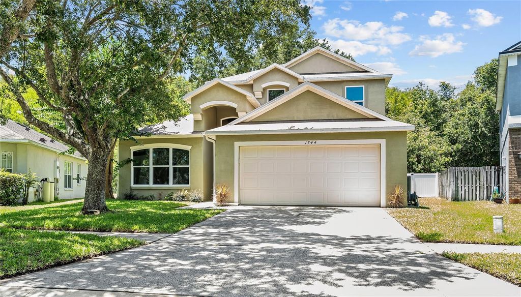 Photo of 1744 Nestlewood Trail, Orlando, FL 32837 (MLS # O6426175)