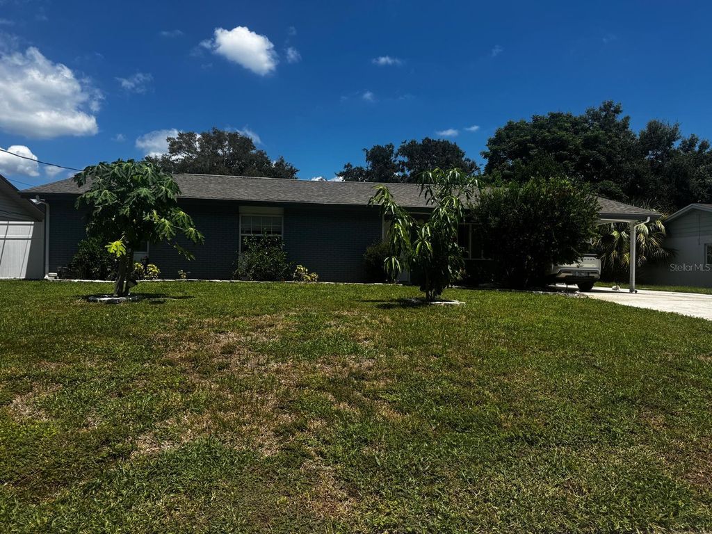 Photo of 1505 Avenue F NE, Winter Haven, FL 33881 (MLS # P4936008)