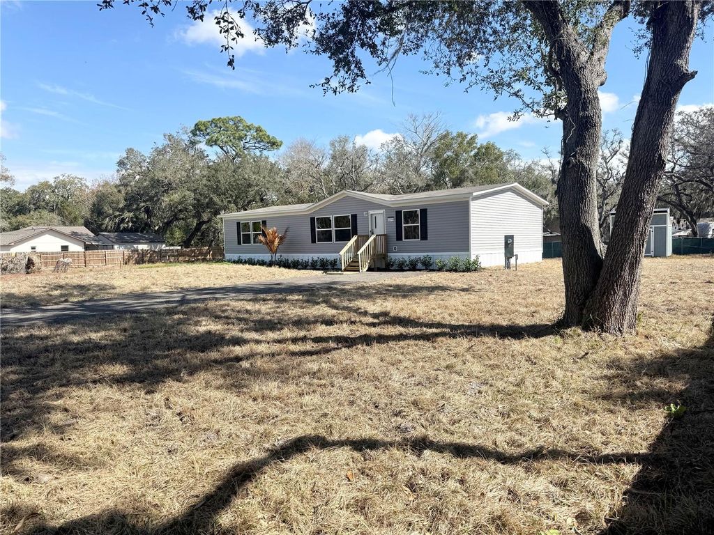 Photo of 12396 Hicks Road, Hudson, FL 34667 (MLS # W7882377)