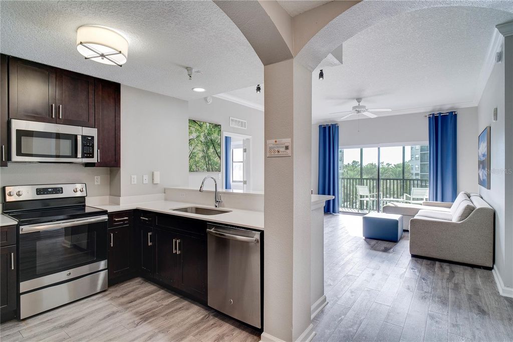 Photo of 14501 Grove Resort Avenue #1440, Winter Garden, FL 34787 (MLS # O6348465)