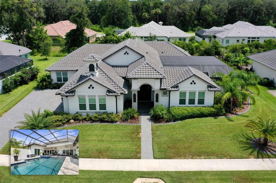 Better than new and crafted for the most discerning buyer, this 2023 ABD Courtyard IV elevates modern Florida living with timeless elegance. Perfectly situated on an oversized lot within the gated community of Toscana, this residence offers 4 bedrooms, 3.5 baths, 2,712 sq. ft. of refined interiors, and a 3-car garage—all enriched with thoughtful upgrades that rival new construction, without the wait.
From the moment you step through the glass entry doors, a private courtyard sanctuary unfolds. A heated saltwater pool, soothing spa, fountains, ambient lighting, sun shelf, and a fully equipped outdoor kitchen with vented hood create an unforgettable setting—all controlled effortlessly through the Hayward Pool Control System. Triple pocket sliders extend the indoor living spaces seamlessly outdoors, perfect for both grand entertaining and quiet retreat.
Inside, the chef’s kitchen shines with quartz counters, fluted wood island, double ovens, glass-front cabinetry, designer lighting, and a spacious walk-in pantry. The family room is elevated with wood beams, a custom shiplap fireplace wall, built-ins, and integrated speakers, while formal dining and versatile flex space ensure both sophistication and functionality.
The Owner’s Suite is a serene escape with private pool access, a spa-inspired bath featuring a soaking tub, dual vanities, frameless glass shower, plantation shutters, and a custom walk-in closet. Guests enjoy the ultimate privacy in a detached casita with en-suite bath and screened patio access.
Additional highlights include generous guest suites, a designer laundry room, epoxy-coated garage floors, wrought-iron fencing, paver driveway, and lush landscaping.
Life in Toscana means lighted sidewalks, manicured streets, and a welcoming community—just minutes from Flagler Beach, fine dining, shopping, schools, and medical care. With HOA dues of only $115/month, this home delivers unmatched value in one of Palm Coast’s premier communities.
Luxury, convenience, and elegance await—ready now, without the delays of new construction.