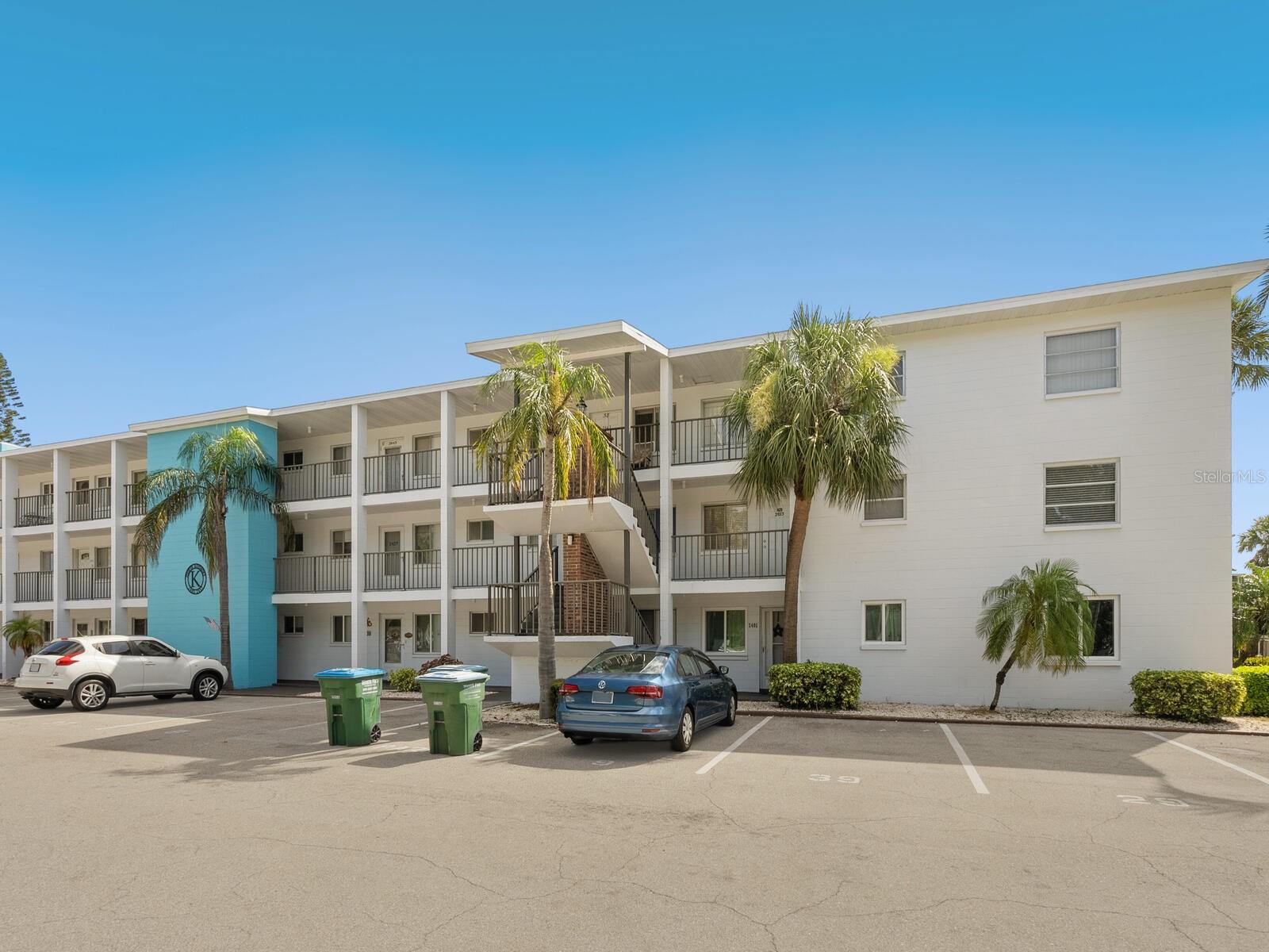 Welcome to your perfect Florida getaway in the popular 55+ community of Fourth Bayshore Gardens! This beautifully updated second-floor 2 bedroom, 2 bath condo has went through a complete floor to cleaning makeover make it completely move in ready. With recent updates that include a newer a/c, newer hot water heater, bathroom vanities, neutral laminate flooring throughout the entire floorplan, all new blinds and freshly painted. The kitchen has room for breakfast table, large closet pantry, tile backsplash and newer appliances. Enjoy peaceful mornings on your private balcony overlooking lush green space—just steps from the clubhouse, heated pool, shuffleboard & bocce courts, grilling stations, laundry facilities, and a serene landscaped courtyard. You’ll love the full calendar of social clubs, potluck dinners, and fun-filled activities. Location can’t be beat, 15 mins to Bradenton Beach, 10 mins to SRQ Airport, Walk to Target, Publix & Library
and the Bus stops right outside. There’s assigned parking, guest parking, and elevators for convenience. Bonus: exterior storage closet + multiple indoor closets for all your beach gear and extras. Low-maintenance, high-enjoyment living—schedule your showing today and start enjoying the Florida lifestyle you’ve been dreaming of!
