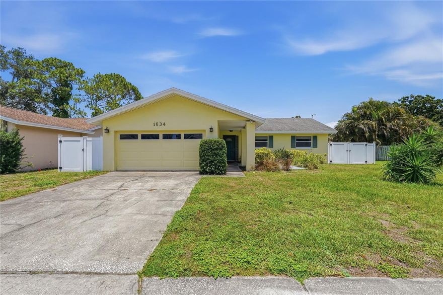 Located in the desirable deed restricted community of Amberlea in the heart of Dunedin, this spacious 3-bedroom, 2 bath home offers room for everyone while being perfectly situated near shopping, dining, schools, entertainment and some of Florida's most award-winning beaches. Space and flexibility in mind, this home features a split-bedroom floor plan, multiple living areas and versatile bonus spaces to accommodate a variety of lifestyles. Luxury vinyl flooring runs throughout the main living spaces, while the two guest bedrooms feature beautifully maintained, plush carpeting.  The recently renovated kitchen features stunning quartz countertops, a pantry and updated stainless steel appliances.  Off the kitchen and family room, French doors open to an air-conditioned multi-use room that adds even more flexibility for entertaining, hobbies, game room space or additional storage. Step outside to the covered back patio, an ideal place for morning coffee or to unwind and enjoy the family in the fenced in back yard.  The yard offers plenty of space to add a shed and the double-wide gate offers convenient access for a boat, golf cart or any of your outdoor toys.  Additional highlights include a two car garage and the potential for a fourth bedroom conversion if desired.  This home truly offers plenty of room for everyone while enjoying the best of the Dunedin lifestyle.