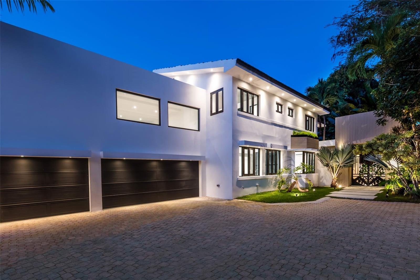 Luxury Home in Tintillo Hills, Guaynabo – A Masterpiece of Modern Design
Property Overview:
Nestled in the Tintillo Hills neighborhood, this newly constructed residence embodies modern luxury and contemporary living. Spanning approximately 9,000 square feet of total construction area, the home features 3,552 square feet of refined interior living space, 5 bedrooms, and 5.5 bathrooms. Every element of this property has been thoughtfully designed, offering breathtaking views, high-end finishes, and seamless indoor-outdoor living.
Interior Highlights:
Open-Concept Design: The double-height living room, bathed in natural light through expansive floor-to-ceiling, impact-resistant glass windows, creates a stunning first impression.
Custom European Kitchen: Features Calacatta Quartz countertops, modern cabinetry, and top-of-the-line appliances.
Master Suite Retreat: A private oasis with a resort-style bathroom, a spacious walk-in closet, and a private balcony showcasing serene views.
Bedrooms: Four additional bedrooms, each with en-suite bathrooms and picturesque views of the lush surroundings.
Luxurious Finishes: Indoor recessed LED dimmable lighting, 40” x 40” porcelain flooring, and premium fixtures throughout.
Outdoor Features:
Expansive Terraces: Over 1,000 square feet of terrace space on the upper level, perfect for entertaining or relaxing.
Lush Landscaping: The grand entry portico is surrounded by meticulously designed greenery, enhancing the home’s curb appeal.
Pool Area: The first-floor living space seamlessly opens to the pool, offering tranquil views of Tintillo Hills.
Additional Amenities:
Private driveway with ample parking.
Three-car garage for convenience and security.
Outdoor architectural lighting for a striking evening ambiance.
Location:
Dining & Entertainment:
Suchville Plaza: Suchville Plaza offers diverse dining options, including Caminito for Argentinian grills and empanadas, Mida with fresh, locally-inspired dishes, Cien Vinos for wine and small plates, La Doña serving Mexican classics like tacos and margaritas, and Dondesea Burgers for gourmet burgers and comfort food.
San Patricio Village: Features San Patricio Square (including El Mercado and Bottles Bistro), as well as notable restaurants like Cayo Caribe.
Caparra Country Club: Offers fine dining, a swimming pool, tennis courts, beach tennis, pickleball, basketball, volleyball, and exclusive social events.
Caparra Area Highlights: Restaurants such as Cacio e Pepe (Italian cuisine) and 5 de Mayo (Mexican cuisine).
Nearby Schools:
Baldwin School of Puerto Rico: International Baccalaureate (IB) program.
Colegio Marista: Renowned education.
Commonwealth-Parkville School (CPS): Private, English-speaking preparatory school.
Colegio PR de Niñas (CPN): Private, Premier all-girls school.
Academia San Ignacio: Private, Elementary school - Colegio San Ignacio: Premier all-boys school. Grades 7-12 - Academia Maria Reina: Premier all-girls school. Grades 7-12.
Schedule a Private Showing: This home offers a rare opportunity to own a newly constructed, modern luxury residence in Tintillo Hills.
Private showings are available by appointment only.