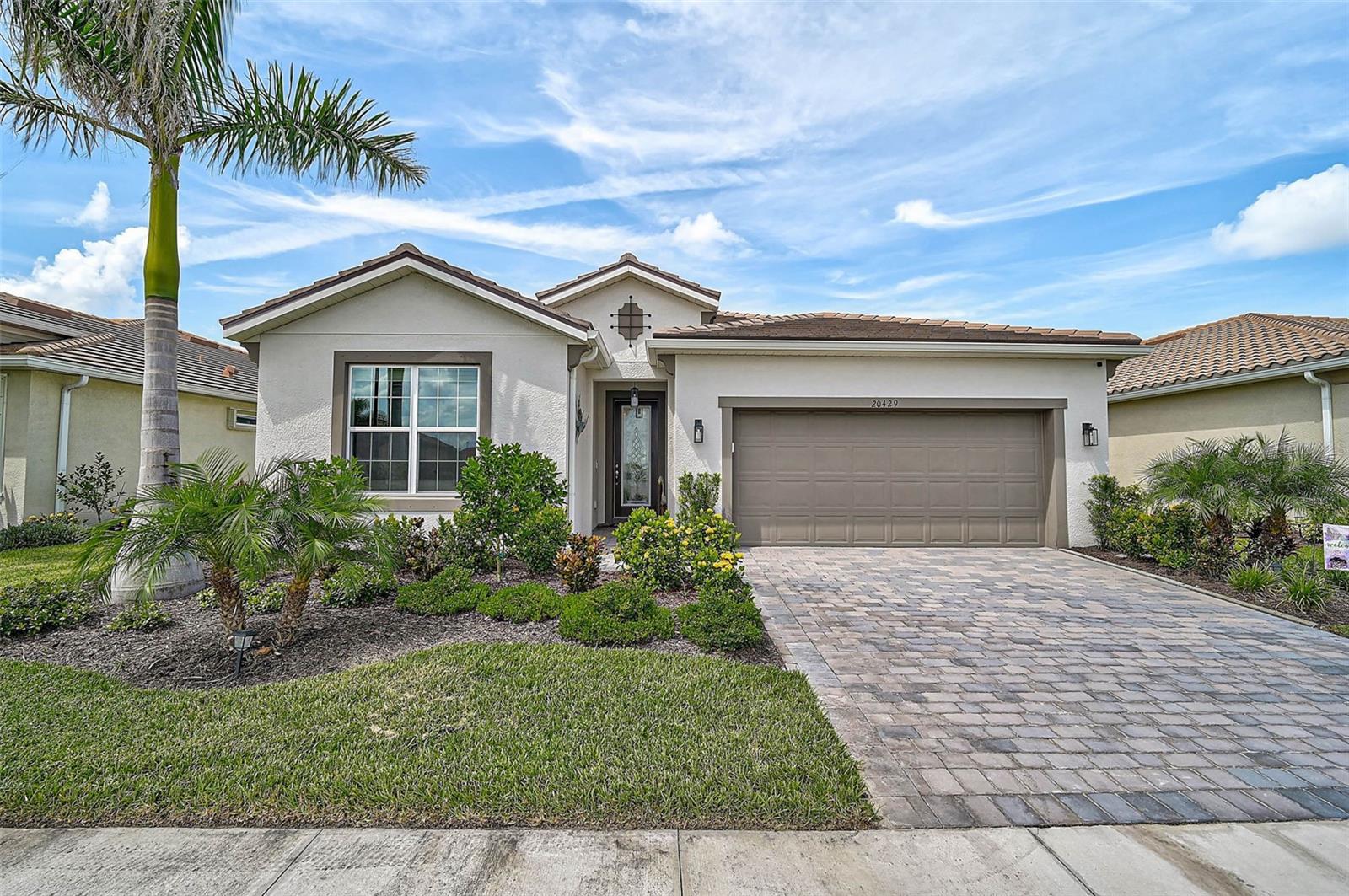 Immaculate Aurora II home with lakefront saltwater pool in Wellen Park Renaissance. This beautiful single family residence blends comfort, style, and outdoor living in a prime location, just two years new and lightly used.
Offering 3 bedrooms plus a flex room, 2 bathrooms, a 2 car garage, and 2,098 square feet of thoughtfully designed living space, the home is located just steps from the community’s private entrance gate for rare and easy access in and out of Wellen Park.
Inside, enjoy light filled open concept living with ceramic tile in the main areas and plush carpet in the bedrooms. Ceiling fans in every room enhance comfort, and the chef’s kitchen is outfitted with stainless steel appliances, quartz countertops, and generous cabinet storage.
The outdoor living space is a private oasis with a heated and chilled saltwater pool overlooking a peaceful lake. Two sets of triple sliding glass doors lead to the extended lanai, which features a custom grill island by Paradise Grills with built in grill, double burner, mini fridge, trash drawer, and extra storage. Two 60" remote controlled ceiling fans keep the space cool, and nearly new outdoor furniture is also available.
A versatile flex room offers the perfect spot for a home office, gym, media room, or guest space. The home has been barely lived in, as the owner resides out of state and has only visited a handful of times, leaving the property in pristine, like new condition. All interior and exterior furniture is available if desired.
Located in the vibrant Wellen Park Renaissance community, this home is close to dining, shopping, top rated schools, and the emerging Downtown Wellen district with easy daily access through a private owner’s gate.