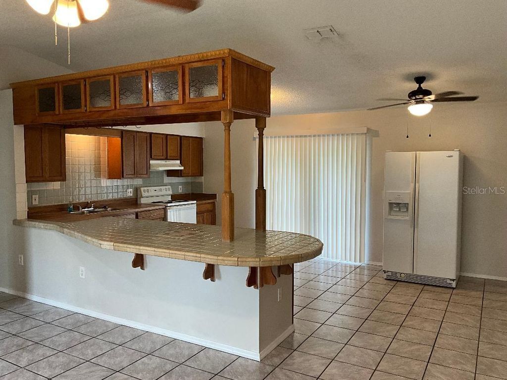 Photo of 499 W Baltimore Drive, Deland, FL 32720 (MLS # V4944839)