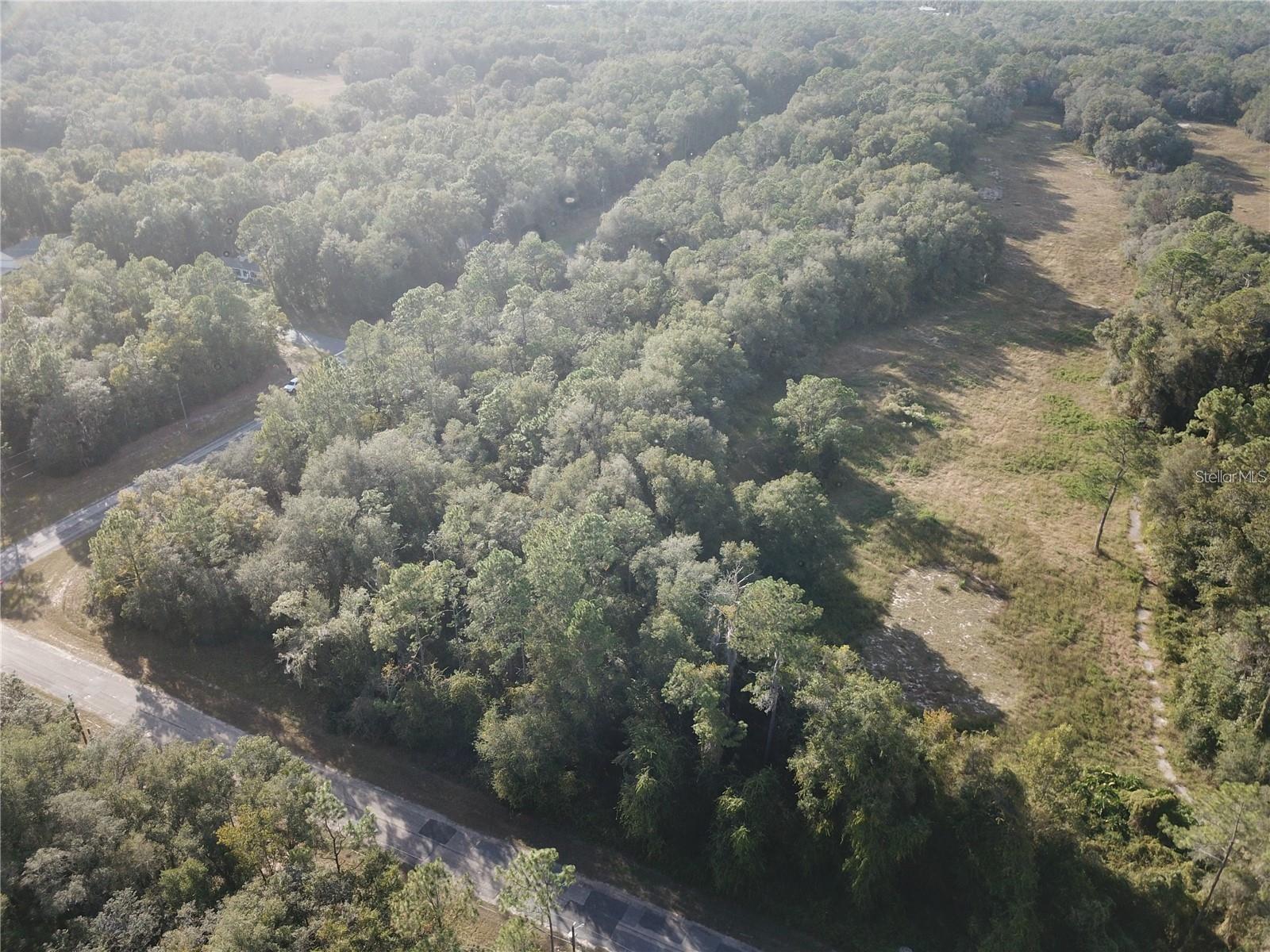 Beautiful lot that has the 10th hole fairway in the back of the property. This is a deeded community but does not have HOA fees. Lots of nature to enjoy.