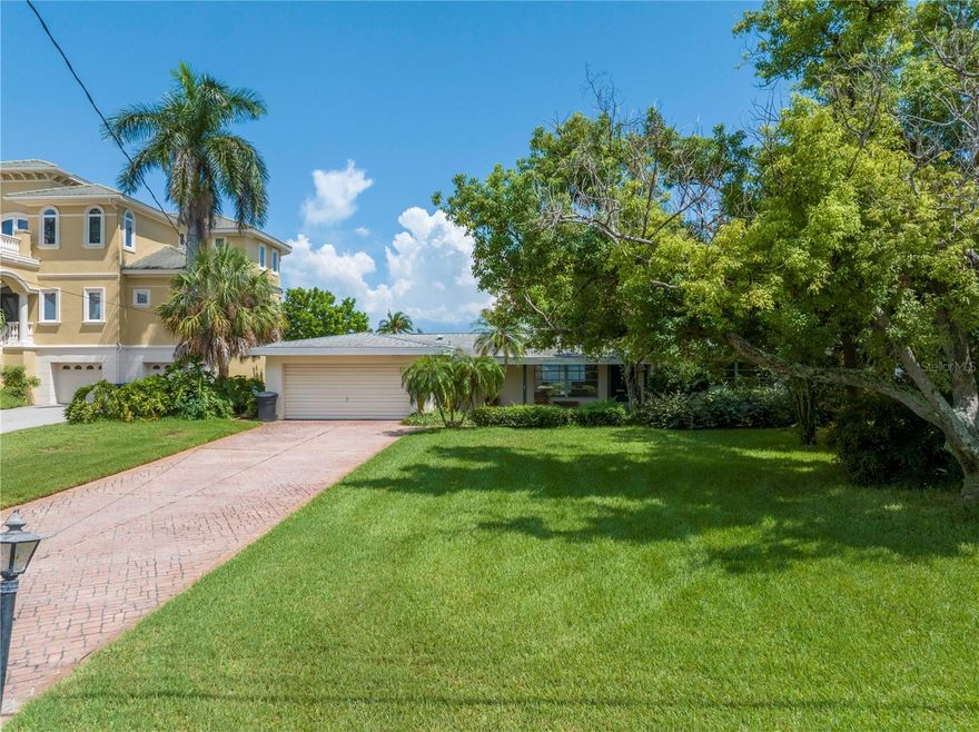 FOR STATISTICAL PURPOSES ONLY. Nice split-plan ranch house with two living spaces and wide open views of Tampa Bay. Terrazzo throughout and vintage finishes in amazing shape. Large 1/3 acre lot with expansive lanai and pool. Dock and seawall replaced 10 years ago, HVAC & HWH also newer.