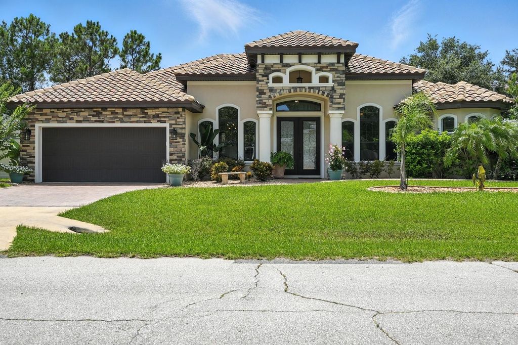 Photo of 42 Felwood Lane, Palm Coast, FL 32137 (MLS # FC310970)