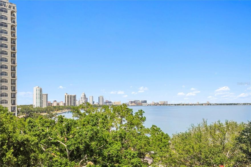 One or more photo(s) has been virtually staged. Beautiful Monte Carlo Towers 7th floor unit has been well maintained & features floor-to-ceiling windows with Breathtaking views of the Bay and Downtown! Enter the double doors to a spacious foyer with diagonal decorative tile entry that leads you to the open concept kitchen, dining and living room! Kitchen includes stainless appliances, solid wood cabinetry, granite counters, large island and your own private trash chute! Spacious primary suite with ensuite bath featuring solid wood cabinetry, a garden tub with shower, marble flooring, and a walk-in closet with a custom organization system. Secondary bedroom features a built-in Murphy bed with storage, offering flexibility for use as a private home office. The adjacent second bathroom is conveniently located just outside the room and includes solid wood cabinetry, a single vanity, and a tub/shower combination. Additional highlights include fresh interior paint and an in-unit laundry closet with washer and dryer. Monte Carlo Towers offers resort style amenities: a 24,000 SF marble lobby, 24-hour concierge, two guest suites, heated pool, grilling area, social room with commercial kitchen, library, fitness center with saunas, and tennis/pickleball courts. Located in a top-rated school district and just minutes to Downtown, Hyde Park, SOHO, Riverwalk, and Tampa International/St. Pete Clearwater Airports, easy access to major highways, including I-275, I-4, and the Selmon Expressway with the nation’s longest continuous sidewalk right outside your door. Experience elevated living at its best. Schedule your private tour today!