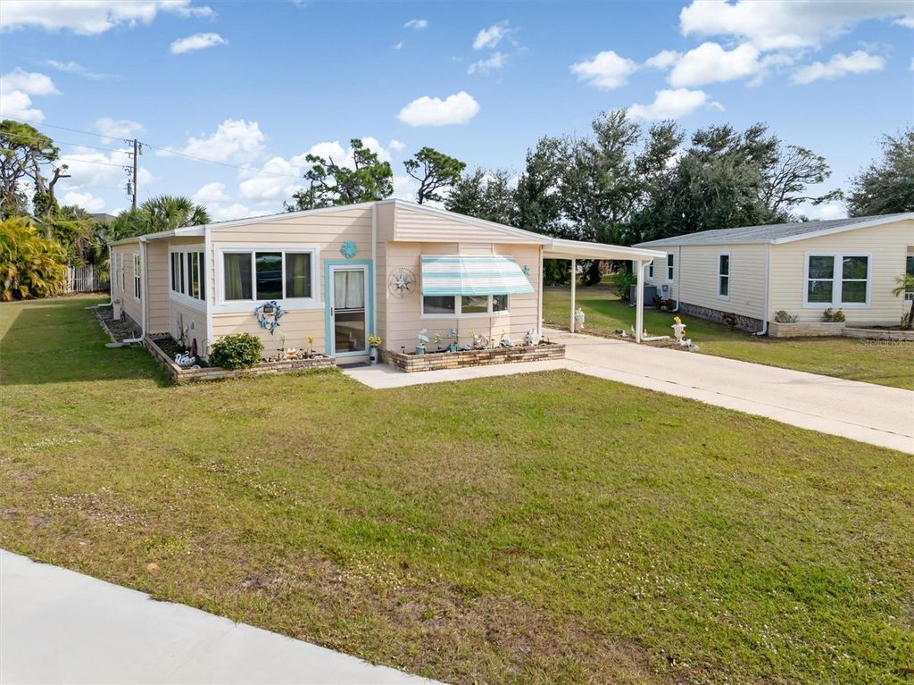 Photo of 3301 Goldfinch Lane, Englewood, FL 34224 (MLS # C7520825)