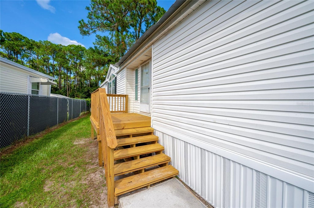 Photo of 13 Lawrence Court, Port Orange, FL 32127 (MLS # V4951303)