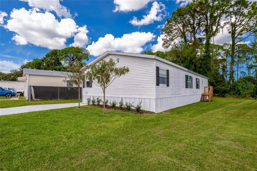 Photo of 13 Lawrence Court, Port Orange, FL 32127 (MLS # V4951303)