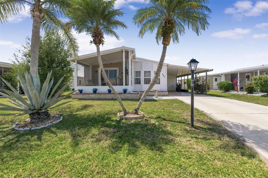Welcome to this sunlit and welcoming two-bedroom, two-bath retreat nestled on a peaceful street in La Casa. Step inside to discover a thoughtfully designed built-in desk area and a handy utility closet by the entry. The kitchen, complete with a breakfast bar and modern appliances, flows seamlessly into a spacious dining and living area. Enjoy meals in the dining space with its charming built-in hutch, or relax in the living room that opens through a newer sliding door to a tiled, screened lanai, perfect for morning coffee or evening breezes, with direct access to the carport. The guest bedroom features a generous walk-in closet with custom shelving, while the guest bath offers a stylish vanity and a tub/shower combination. The primary bedroom is a true sanctuary, boasting a storage closet, two double closets, and an en suite bathroom with a brand-new double-sink vanity and a convenient piggyback washer and dryer. The master bath includes a walk-in shower for added comfort. Throughout the home, you'll appreciate thoughtful upgrades like luxury laminate flooring over sturdy plywood subfloors, fresh baseboards and casings, new windows installed in 2022, an asphalt shingle roof installed in 2022, a 2021 water heater, a rebuilt A/C with new parts and motor installed in 2023, and updated electric and plumbing. The exterior showcases durable plywood sheeting, wrap, and vinyl siding. A long carport leads to a versatile utility room with extra storage and a workbench. This home has been well cared for, both inside and out. The Community of La Casa, where 974 stunning homes are elegantly nestled among a tapestry of native trees, offers a serene escape surrounded by spacious common areas and eight picturesque lakes. La Casa is perfectly situated between Sarasota and Fort Myers, and embodies the ultimate lifestyle on Florida’s Gulf Coast—a true boaters paradise with access to the breathtaking Gulf of Mexico. Enjoy the convenience of nearby shopping, exciting sightseeing, world-class golfing, and abundant fishing and boating opportunities, all while indulging in the rich culture and refined elegance for which Southwest Florida is celebrated. As you immerse yourself in the warmth of Southwest Florida’s winters, you’ll find yourself in a relaxed and unhurried atmosphere, far removed from the hustle and bustle of the east coast. Our community is adorned with lush, mature landscaping that reflects the loving care both residents and management dedicate to preserving its beauty. Stay connected while basking in the sun with our complimentary wireless Internet (Wi-Fi), available at the Clubhouse, Activity Building, and Recreation Hall. Whether you’re catching some rays or catching up on emails, La Casa has it all. Does this sound appealing? La Casa is not just a community; it’s a welcoming family-friendly haven.