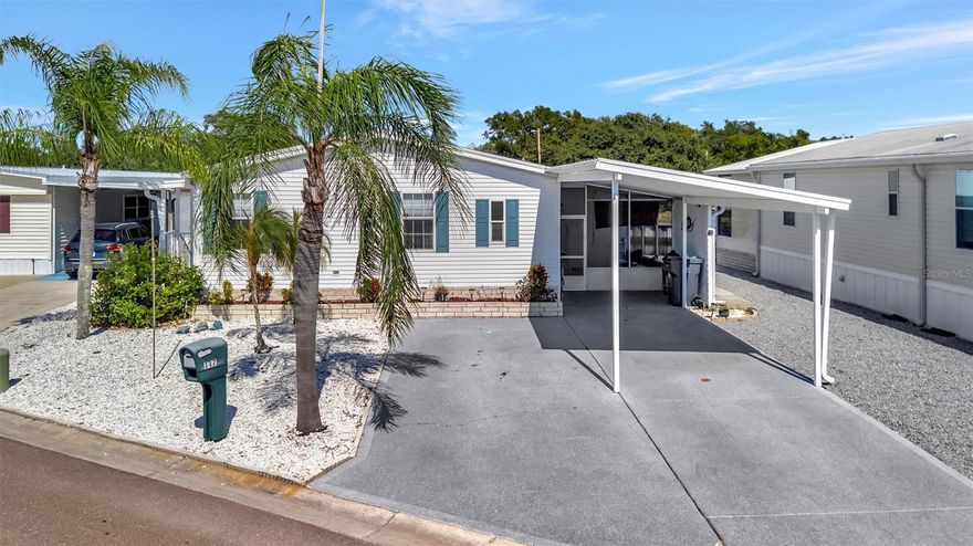 Welcome to Caribbean Isles Residential Cooperative. This home is a large 2 bedroom, 2 bath home. New A/C Unit with new Duct Work, New A/C Split Unit in the Primary Bedroom, New Kitchen Cabinets, New Luxury Vinyl Flooring throughout and new appliances. Large eat-in Kitchen with the Laundry just off the Kitchen in a separate room. The Primary Bedroom has a large Walk-in Closet with an Ensuite. Great Room to just sit and watch the Boats go by on the Canal. The home is low maintenance, Recently Remodeled and well-maintained. Caribbean Isles Residential Cooperative is a highly desired community to live in. It is a VERY Active 55+ community. From Shuffleboard and Bocce Ball to Corn Hole and Horseshoes. We welcome Golf Carts and several times a year we gather and decorate for Parades. The Clubhouse is used for Dances, Games, Dinners and more. In the Clubhouse we have a well-stocked Library and a large Craft Room. The Game Room has 3 Billiard Tables, 2 Poker Tables, a Bar Shuffleboard with 2 Dart Boards. Don't miss this opportunity.