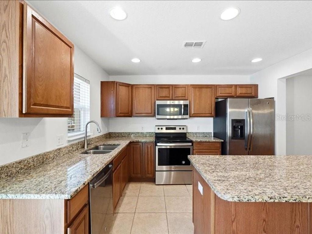 Photo of 3740 Woodbury Hill Loop, Lakeland, FL 33810 (MLS # P4937908)