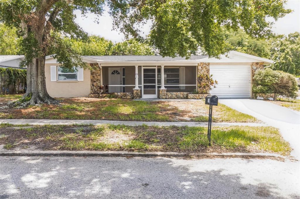 Photo of 5746 Embay Avenue, New Port Richey, FL 34652 (MLS # TB8398959)