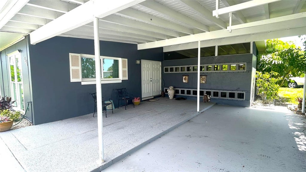 Photo of 721 Sharon Circle, Port Charlotte, FL 33952 (MLS # C7530105)