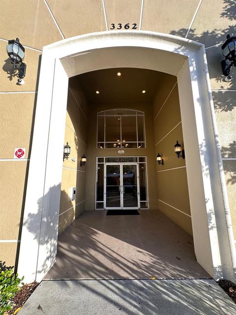 Photo of 3362 Robert Trent Jones Drive #40107, Orlando, FL 32835 (MLS # O6287060)
