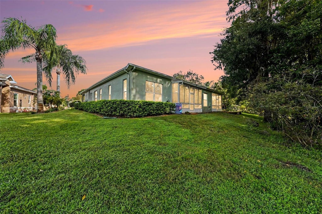 Photo of 12126 Tournament View Ave, New Port Richey, FL 34654 (MLS # TB8542743)