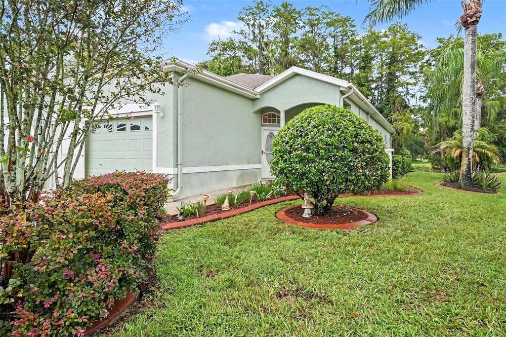 Photo of 12126 Tournament View Ave, New Port Richey, FL 34654 (MLS # TB8542743)