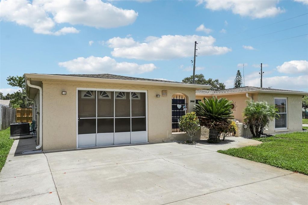 Photo of 3401 Pinon Drive, Holiday, FL 34691 (MLS # TB8395226)