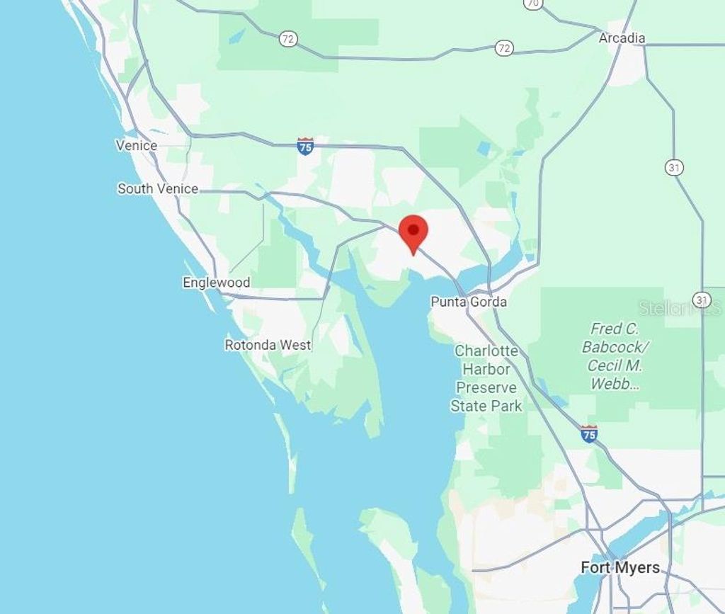 Photo of 373 Skylark Lane NW, Port Charlotte, FL 33952 (MLS # O6331180)