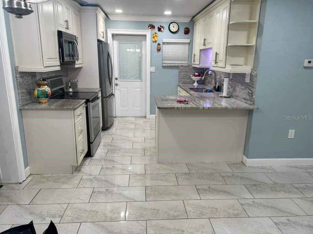 Photo of 5504 Aldana Drive, Tampa, FL 33614 (MLS # TB8487134)