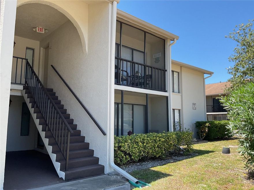 New Listing for Prime Pine Ridge 55 plus Community.  A charming first floor home in the quiet East side of Pine Ridge but only a few minute walk to the pool and clubhouse where all the fun is happening.  This home has the larger living room with lots of natural light and the dining area included in the open floor plan.  In the kitchen is a newer refrigerator and plenty of counter space for cooking delicious meals. The primary bedroom has the en suite bathroom and walk-in closet.  The guest bedroom also has a walk-in closet and is nice size.  The guest bathroom has a tub/shower combo for that well deserved soak after a long day.  The lanai faces East for your morning coffee or a nightcap in the evening.  The walking trail surrounds the property and leads to the clubhouse for shuffleboard, swimming or lounging in the hot tub.  The clubhouse hosts several weekly events.  Come see this unique home and make it yours.