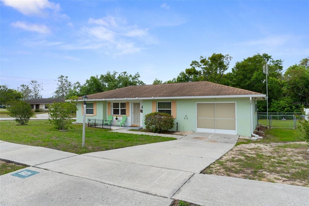 Photo of 5121 Springwood Road, Spring Hill, FL 34609 (MLS # W7884607)
