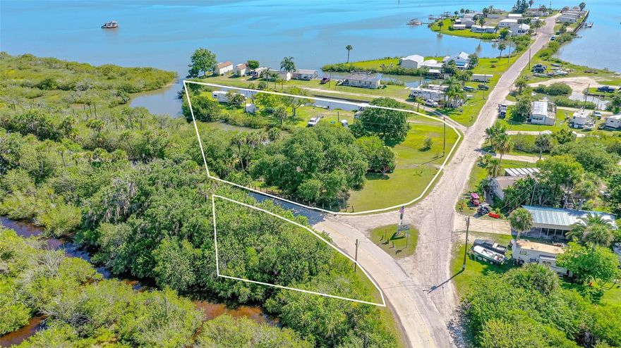 OVER 600 FEET OF WATER FRONTAGE PROPERTY ON THE ALMOST 1-ACRE PARCEL DIRECTLY CONNECTED TO INTRACOASTAL ON MOSQUITO LAGOON, WHICH IS THE AREA'S MOST BEAUTIFUL AND SPORTING RICH WATERWAY AND HAS COME TO BE KNOWN AS THE REDFISH CAPITAL OF THE WORLD!. THE PROPERTY IS ZONED B-2 MARINE ORIENTED COMMERCIAL AND IS CURRENTLY INCOMING PRODUCING WITH A MOBILE HOME ON A LAND LEASE AND 4 ADDITIONAL RV HOOK-UPS. 2 RV’S ARE PRESENTLY OCCUPYING WITH 2 ADDITIONAL HOOK-UPS. HAS A DOCK AND BOATHOUSE. HAS AN AREA USED TO LAUNCH KAYAKS, CANOES AND SMALL CRAFT. CITY IS PRESENTLY PLANNING EXTENSION OF AN ADDITIONAL WATERLINE TO THE AREA. THE PROPERTY OFFERS GORGEOUS RIVERFRONT VIEWS, WALKING DISTANCE TO POPULAR GOODRICH SEAFOOD RESTAURANT, PUBLIC RIVERFRONT BEACH, BEAUTIFUL WATERFRONT PARKS AND BOAT LAUNCHING FACILITIES. SOUTHEAST VOLUSIA AREA IS ALSO KNOWN FOR GOOD SHOPPING AND GREAT RESTAURANTS. THERE IS ALSO ADJACENT 42.83 ACRES WITH AN ADDITIONAL 873’+ FEET OF WATERFRONT AVAILABLE THAT COULD BE COMBINED WITH THIS PURCHASE. ;Water: Available at Site