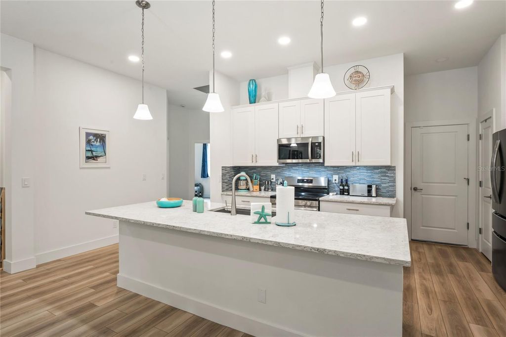 Photo of 11153 Wood Owl Ave, Weeki Wachee, FL 34614 (MLS # TB8428850)