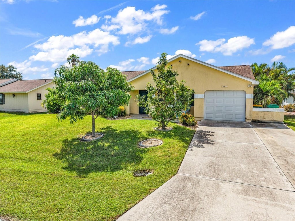 Photo of 9371 Heartwellville Avenue, Englewood, FL 34224 (MLS # C7530706)