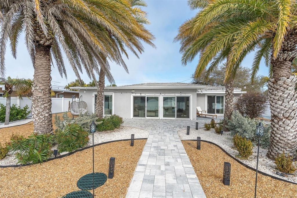 Photo of 9020 Gulf Boulevard, St Pete Beach, FL 33706 (MLS # TB8476742)