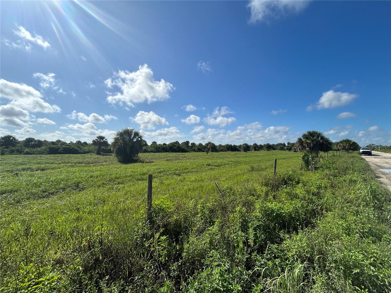 7.5 Acres of high and dry Agriculturally zoned land in the heart of Punta Gorda, Florida! RARE large tract, ideally located in the Charlotte County Ranchettes, presents an exceptional opportunity as this parcel consists of 6 platted lots for up to 6 homes to be built! Property is already cleared, shovel ready and has electric service at the property. These AG parcels are perfect for farming ventures, allowing you to cultivate your own crops or raise livestock for business or pleasure. The Ranchettes is a 2,400 acre dirt road neighborhood perfect to ride your horses, SXSs or 4 wheelers and meet your neighbors. Additionally, the proximity to downtown Punta Gorda (a quick 10 minute drive) ensures that you're never far from restaurants, shops and events that the area has to offer. For added convenience, grocery stores are just a stone's throw away (5 - 10 min), allowing you to easily stock up on essentials without the long drives. Don't miss out on the chance to own a piece of agricultural bliss in Punta Gorda, where rural charm meets modern convenience. Conveniently positioned close to I75 interchanges, accessing major transportation routes for commuting is a breeze, making this location ideal for those who value connectivity and accessibility.