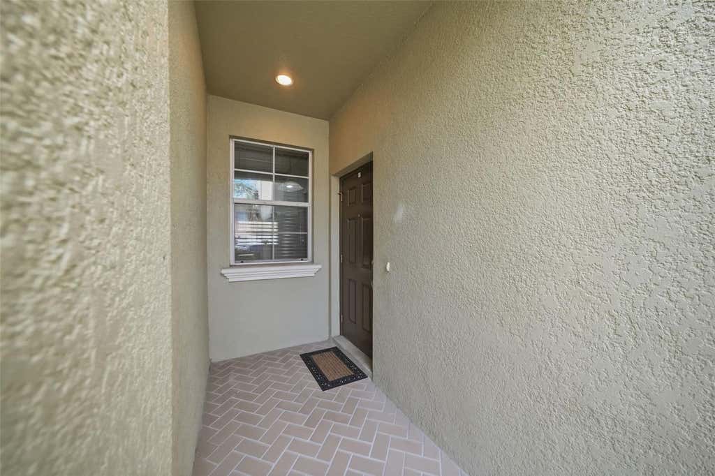Photo of 9484 Trumpet Vine Loop, Trinity, FL 34655 (MLS # TB8540757)