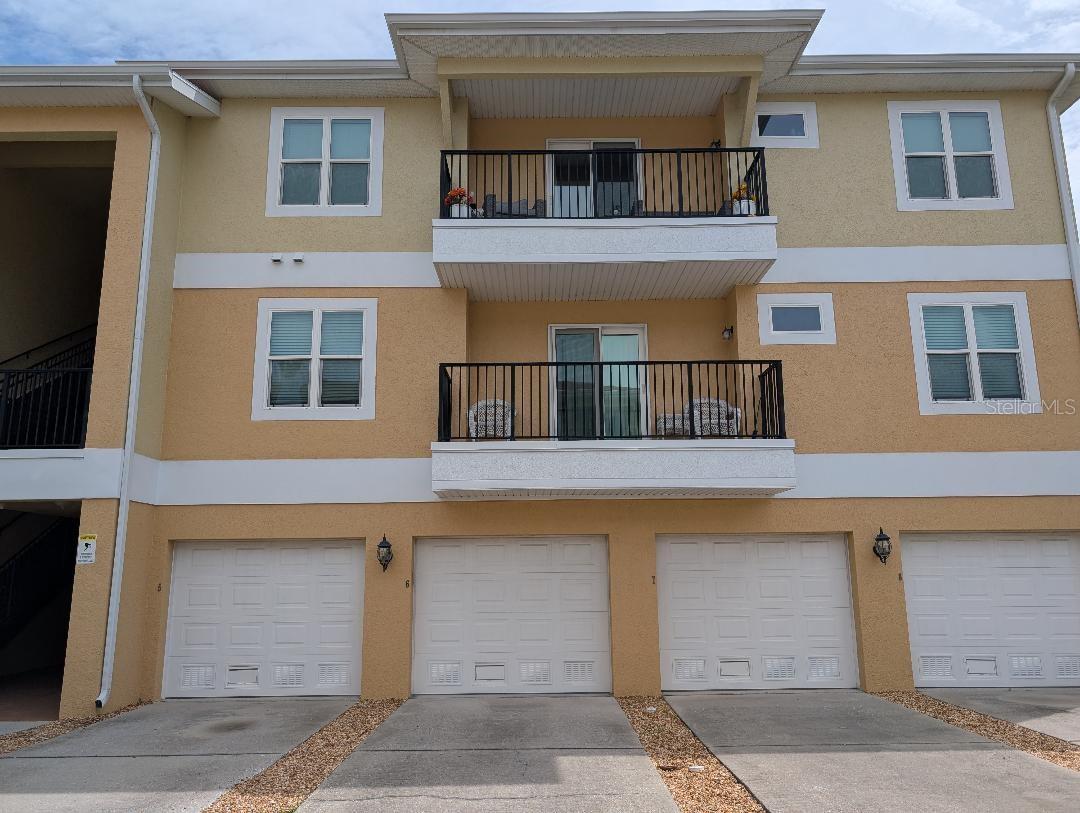 Regency Palms immaculate kept 3 bedroom 2 bath 1 car garage condo located near restaurants, shopping and downtown New Port Richey. This condo features upgraded kitchen cabinets, granite tops, stainless steel appliances, laminate floors, carpet in the bedrooms. Inside laundry .Split bedroom plan with second bath, tub and shower combo. .The master bedroom offers you space and privacy as well as a walk in closet and master en-suite with walk in shower. Additional 10x 16 storage area downstairs . Additional amenities include a community pool, spa, grill station, private bathrooms, and fenced dog run. Monthly fee covers cable, internet, exterior maintenance, water and trash. You have the option to join at low-cost membership to a private beach through the Gulf Harbor Beach Club. Green Key beach 5 minutes away by car. Downtown of New Port Richey 10 min walk. Great price.